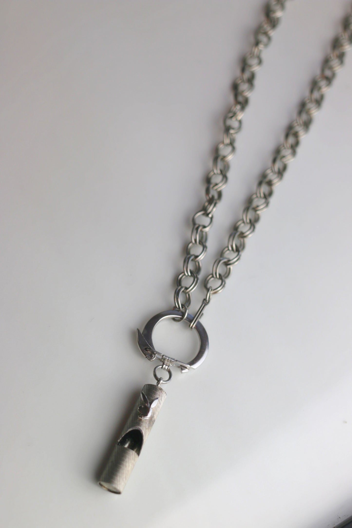 Vintage Play Boy Whistle Necklace